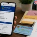 Warga mengecek status desil Kemensos secara online melalui situs Cek Bansos menggunakan NIK di ponsel.